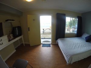 View of entrance and one bed area in room 10 at Jasper Way Inn in Clearwater