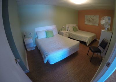 Bedroom in Room 14 at Jasper Way Inn & Motel