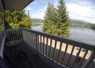 Balcony, lake and BBQ areas from in Room 7 at Jasper Way Inn lodging in Clearwater, BC
