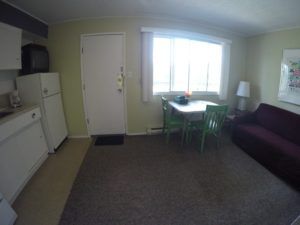 Dining, Living and Kitchen area in Room 8 at Jasper Way Inn lodging in Clearwater, BC