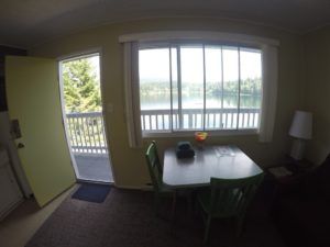 Dining, entrance and outside view in Room 8 at Jasper Way Inn lodging in Clearwater, BC